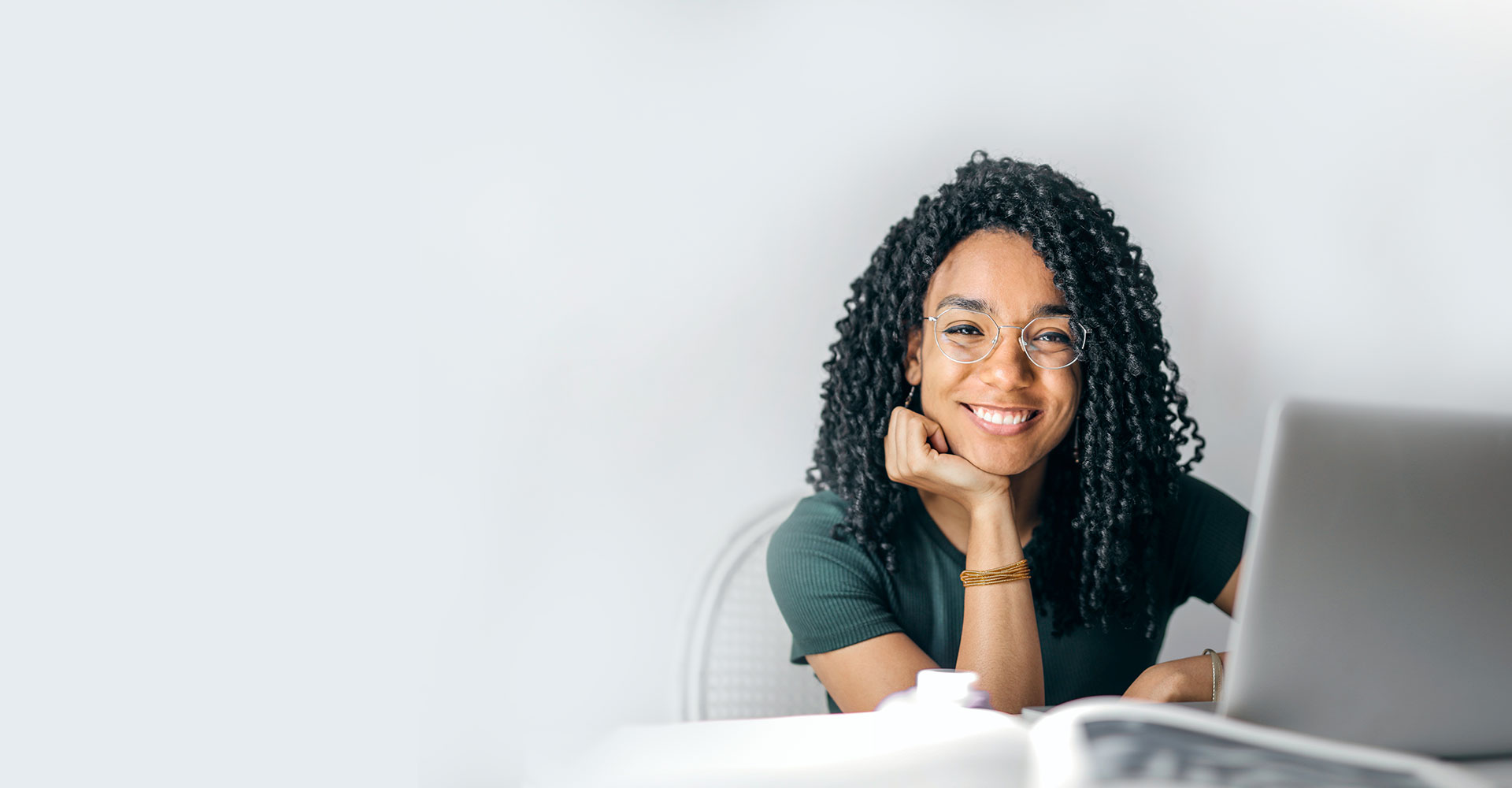 Business owner reviewing financial dashboard charts on a laptop